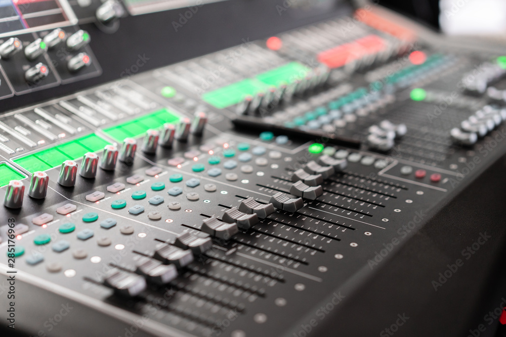 control Fader. Mixing console of light equipment operator at the concert. Sound recording studio mixing desk with engineer or music producer control Fader. Mixing console of light equipment operator at the concert. Sound recording studio mixing desk with engineer or music producer