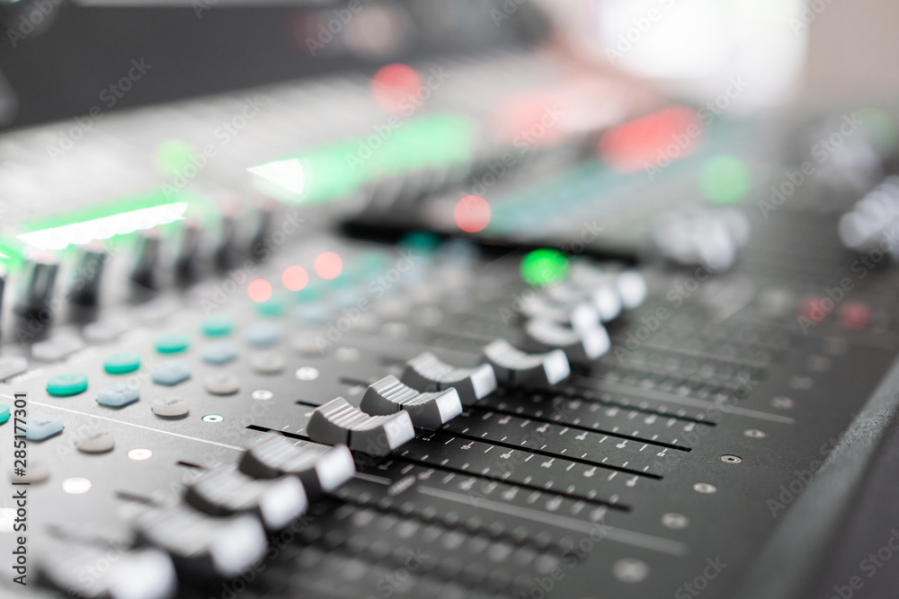 Music mixer equalizer console for mixer control sound device. Sound technician audio mixer equalizer control. Mastering For Radio and TV Broadcast. Music mixer equalizer console for mixer control sound device. Sound technician audio mixer equalizer control. Mastering For Radio and TV Broadcast.