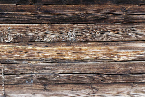Old dark wood texture background. Tinted Wooden surface with natural pattern with vignette