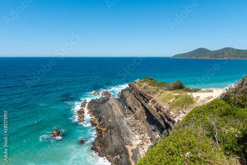 Rocks formations over looking the ocean and mountains © Hal Photography
