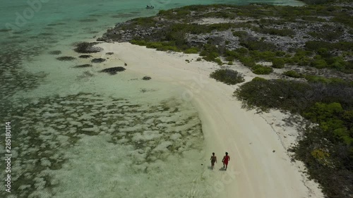 Wallpaper Mural Aerial Drone Video of people walking alone in a exotic tropical caribbean island beach Torontodigital.ca