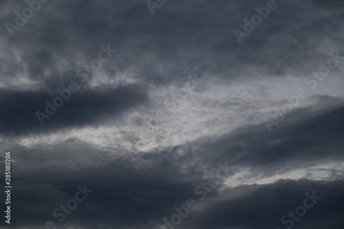 Scenery of thunderstorm black sky in rainy season. 