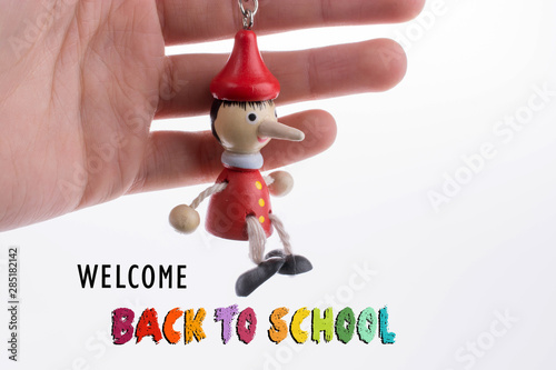 Wooden pinocchio doll with ...