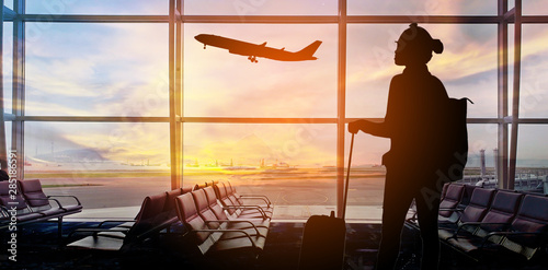 Silhouettes passenger airport. Airline travel concept... photo
