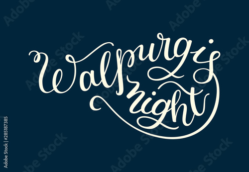 Hand lettering Walpurgis Night. Isolated on dark background.