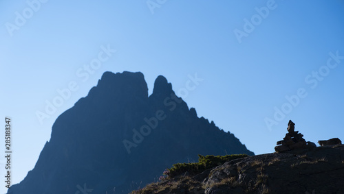 Signaling trails with the Midi d'Ossau peak in the background, Pyrenees natural park, France