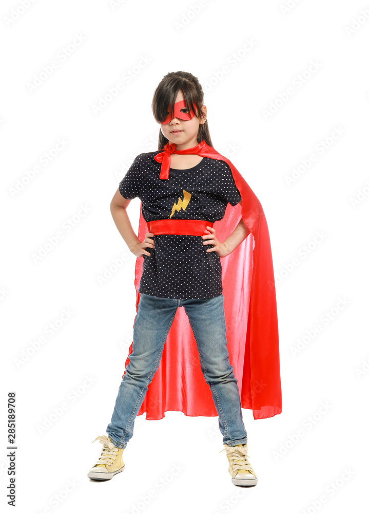 Cute little girl dressed as superhero on white background Cute little girl dressed as superhero on white background