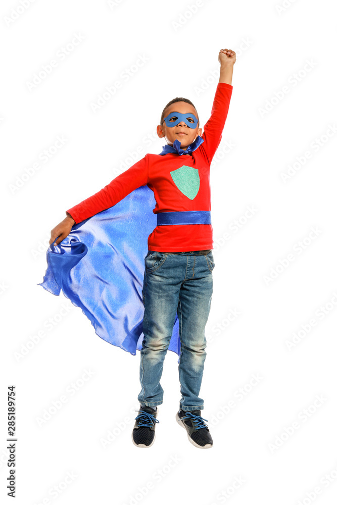 Cute African-American boy dressed as superhero on white background Cute African-American boy dressed as superhero on white background