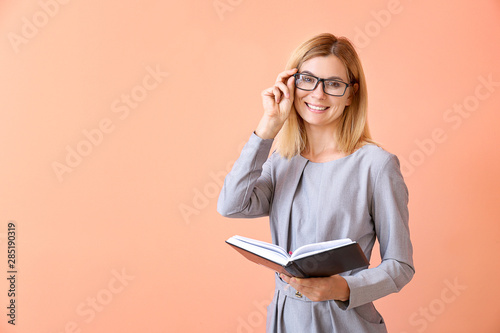 Beautiful female teacher wi...