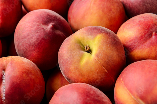 Many ripe sweet peaches  closeup