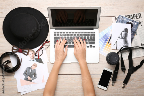 Hands of female photographe...