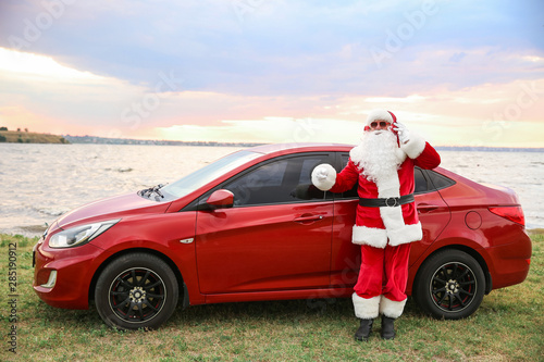 Santa Claus listening to mu...
