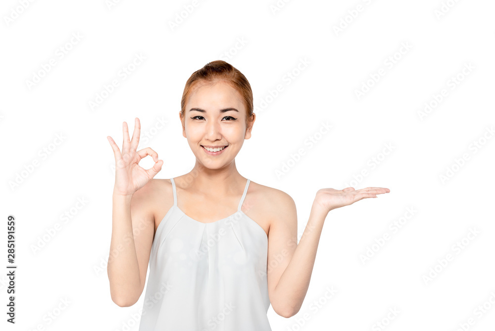 Closed up portrait of cheerful happy excited asian woman wearing a white casual and showing ok sign with beaming smile, clean skin and smooth straight blonde hair. isolated on white background Closed up portrait of cheerful happy excited asian woman wearing a white casual and showing ok sign with beaming smile, clean skin and smooth straight blonde hair. isolated on white background