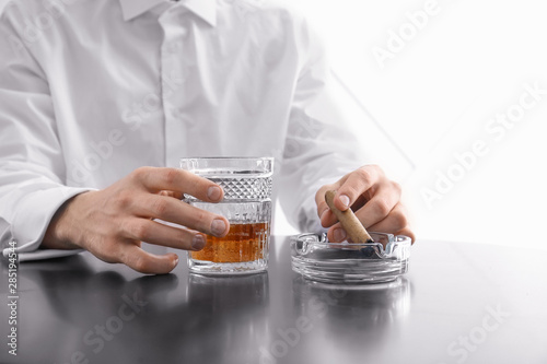 Man in white shirt holding ...