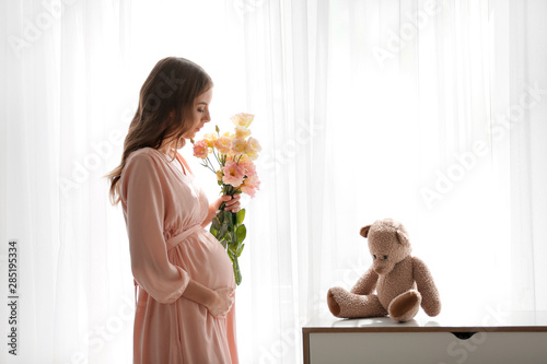 Beautiful pregnant woman wi...