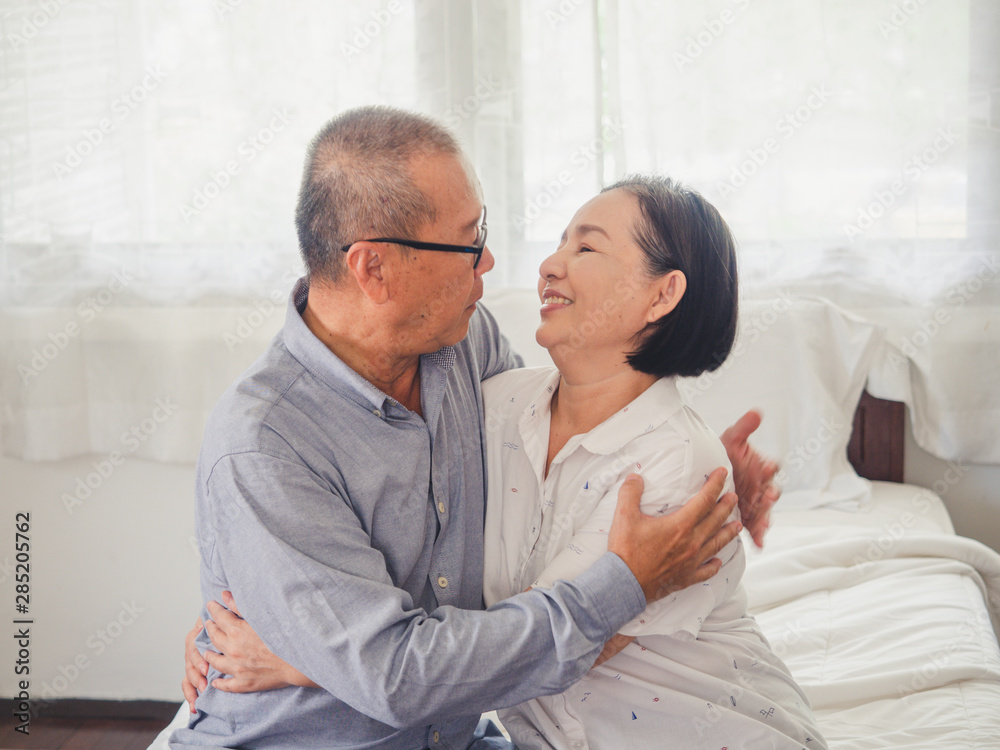 Old couples are showing love for each other,elder man hug elder woman Old couples are showing love for each other,elder man hug elder woman