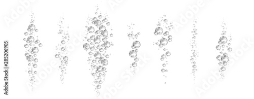 Underwater black fizzing air bubbles on white background.