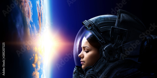 Astronaut and planet, human in space concept