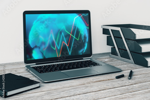 Laptop closeup with forex graph and world map on computer screen. Financial trading and education concept. 3d rendering.