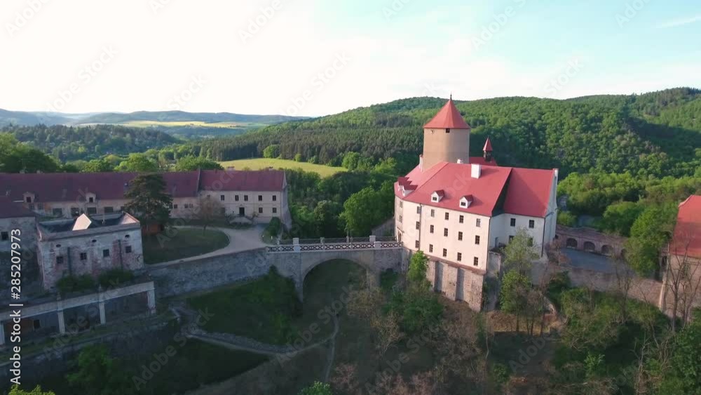 Aerial view of renovated castle, river and forest around Aerial view of renovated castle, river and forest around