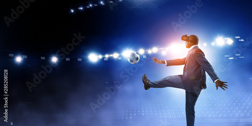 Black businessman on virtual reality football match © Sergey Nivens