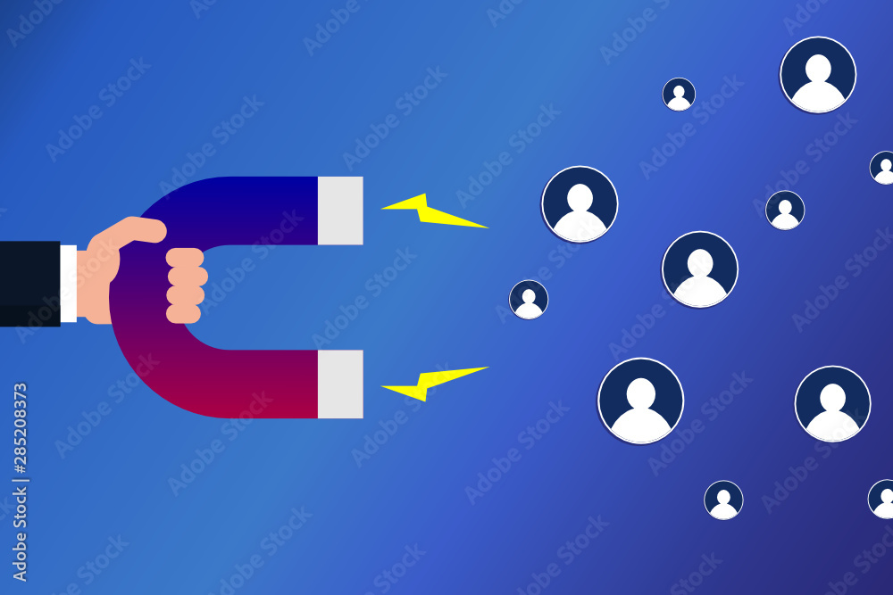 Hand with a attracting followers. Social media marketing concept