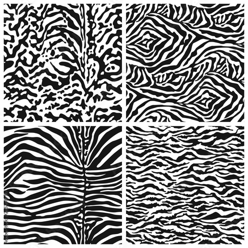 Zebra and tiger skin abstract fur vector seamless pattern in black and white