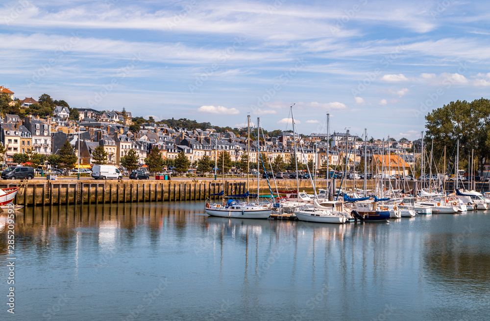Port of Deauville and city skyline in a sunny summer day, Normandy, France.