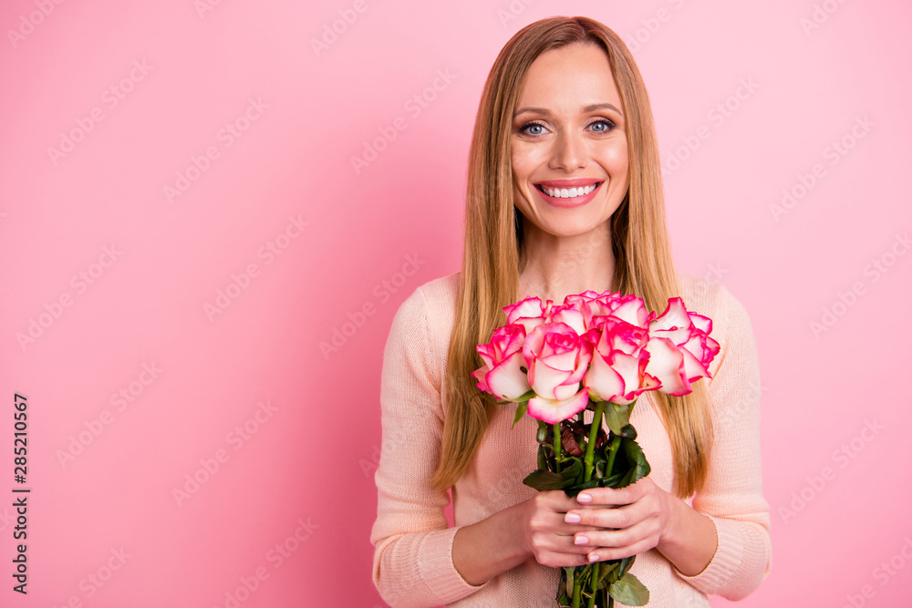Portrait of magnificent lady hold hand isolated over pink background