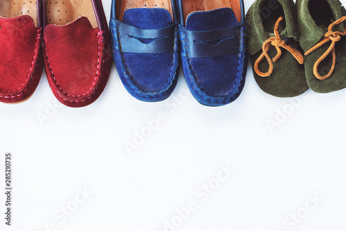 Child shoes on a background with space for text. Top view