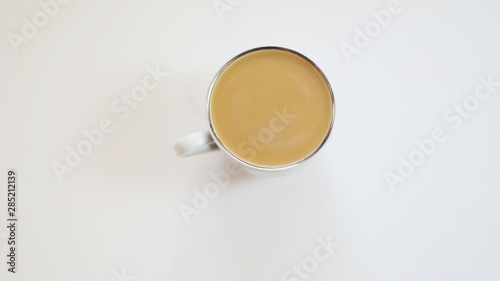 Cup of coffee on old textured background