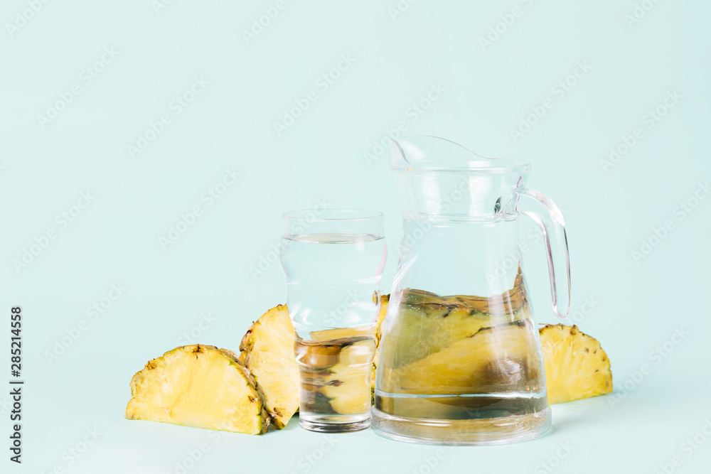 Cut slices of pineapple with water jug Cut slices of pineapple with water jug