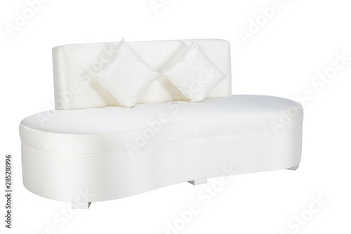 Leather sofa for three persons in white color with a pillows