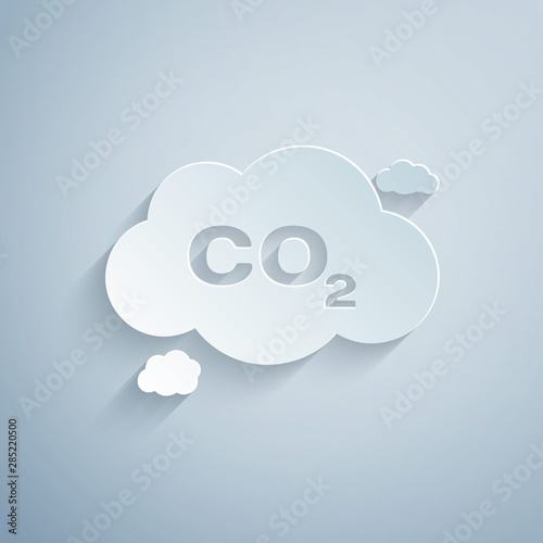 Paper cut CO2 emissions in cloud icon isolated on grey background. Carbon dioxide formula symbol, smog pollution concept, environment concept. Paper art style. Vector Illustration