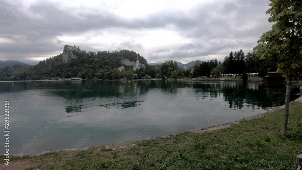 4K: Right side moving left pan view lake Bled on rainy day, Slovenia 4K: Right side moving left pan view lake Bled on rainy day, Slovenia