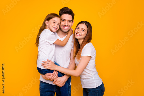Portrait of three nice attractive charming cute lovely sweet tender gentle kind cheerful cheery person spending holiday weekend life isolated over bright vivid shine yellow background © deagreez