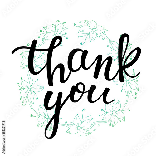 Hand lettering thank you and a floral wreath on white background