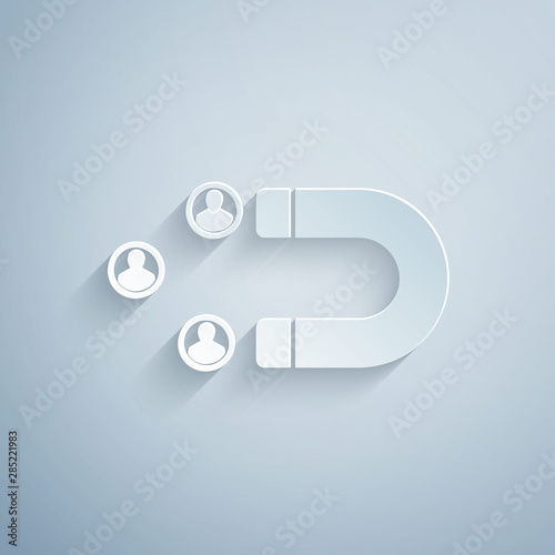 Paper cut Customer attracting icon isolated on grey background. Customer retention, support and service. Customer people attracting with magnet. Paper art style. Vector Illustration