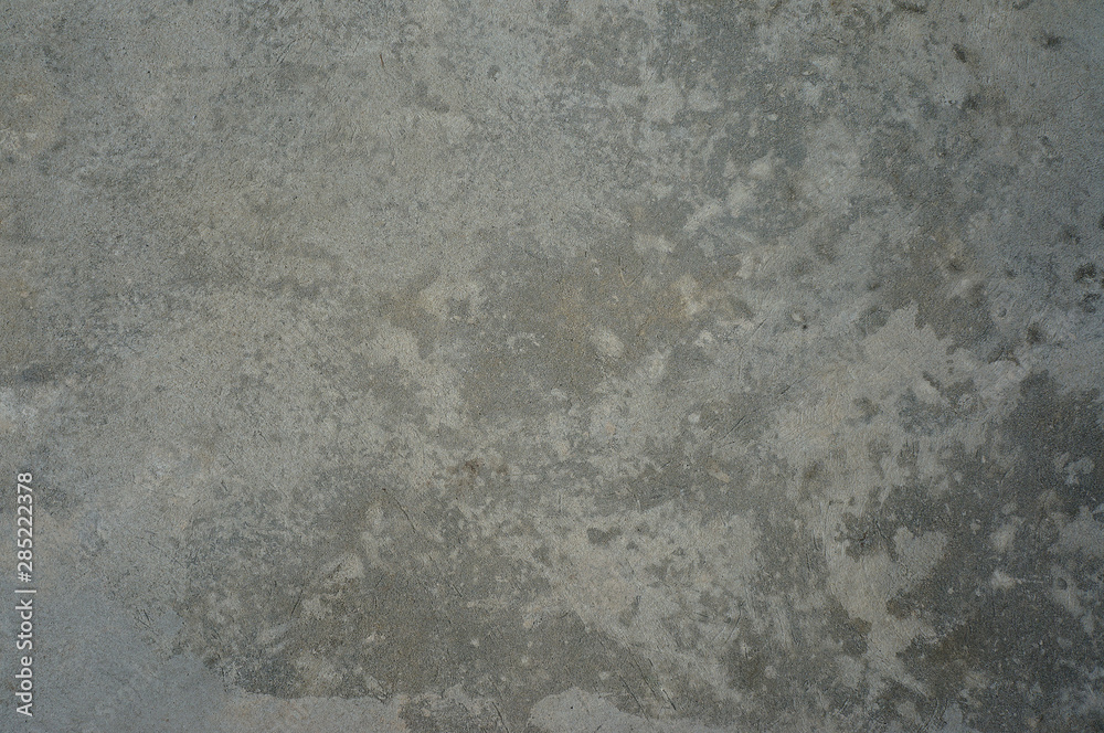 Rough plaster and cement grunge background texture. Grain, fragments and pieces. Rough plaster and cement grunge background texture. Grain, fragments and pieces.