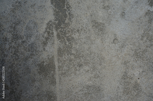 Rough concrete photo texture with debris  grain and scratches.