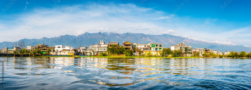 Landscape of Erhai Lake, Dali Ancient City (Dali Old Town) and Cangshan Mountain. Located in Dali, Yunnan, China.