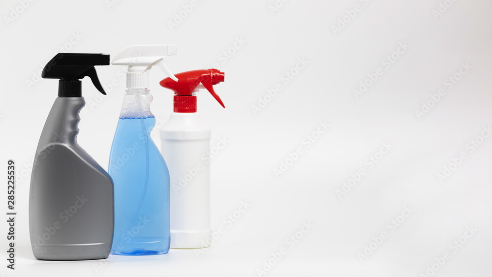 Arrangement with different spray bottles Arrangement with different spray bottles