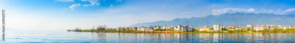 Landscape of Erhai Lake, Dali Ancient City (Dali Old Town) and Cangshan Mountain. Located in Dali, Yunnan, China.