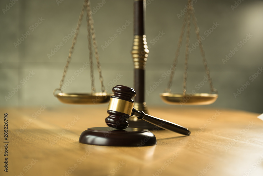 Law and Justice Concept Image, Grey stone background Law and Justice Concept Image, Grey stone background