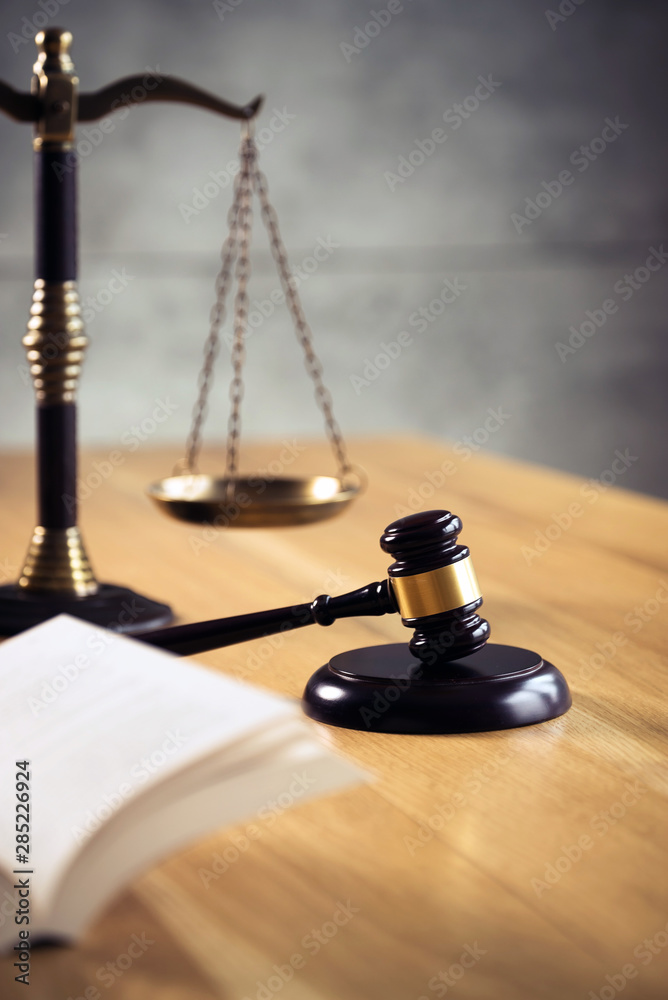Law and Justice Concept Image, Grey stone background Law and Justice Concept Image, Grey stone background