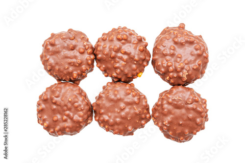Six сookies with chocolate icing on white background, isolated
