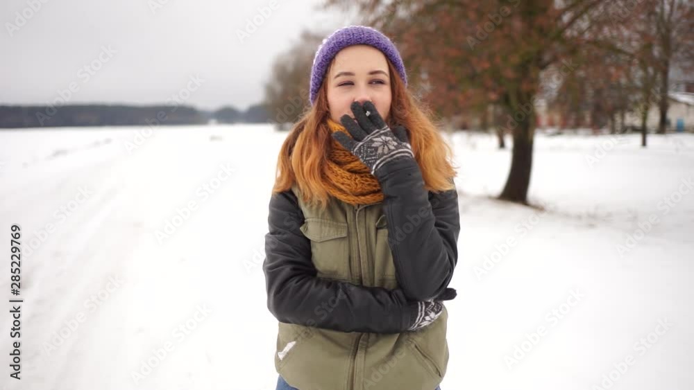 Beautiful young girl Smoking a cigarette. A young girl smokes and coughs. Cough from Smoking. Beautiful young girl Smoking a cigarette. A young girl smokes and coughs. Cough from Smoking.