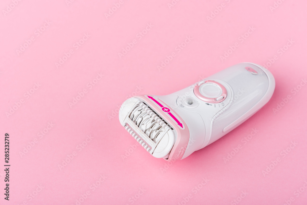 Epilator on pink background. Epilator on pink background.