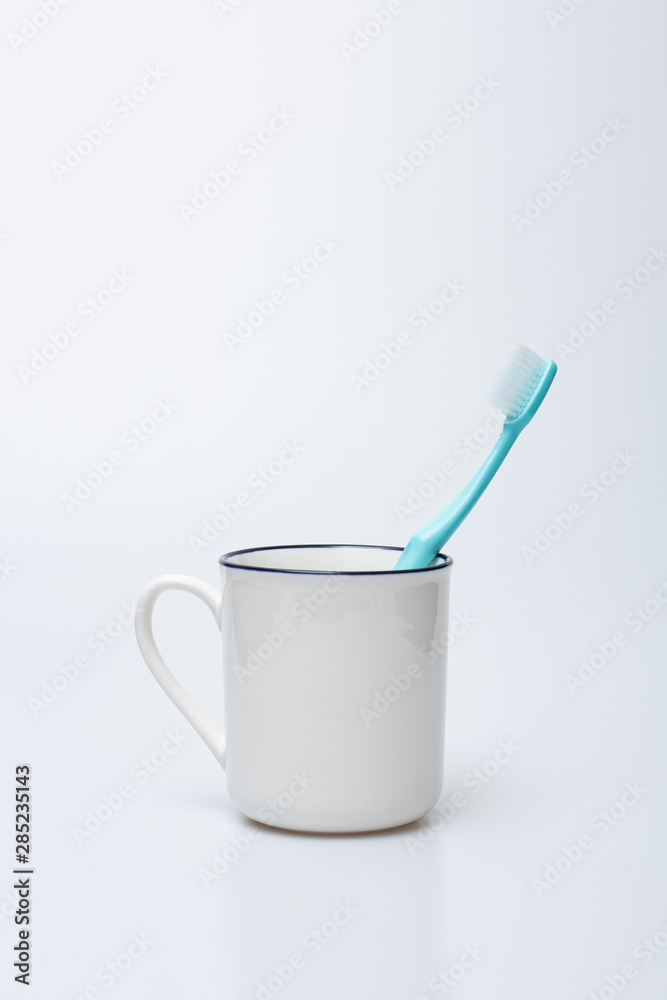 Toothbrush, toothpaste and cup Toothbrush, toothpaste and cup