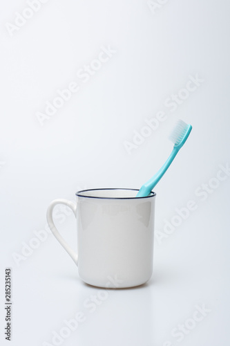 Toothbrush  toothpaste and cup